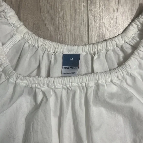 White old navy dress. Open pieces in each side showing midriff. Size medium. - Picture 2 of 5
